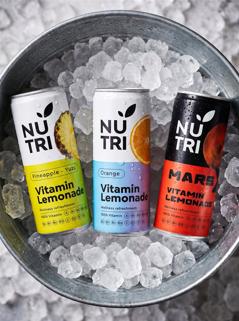 All three NUTRI Vitamin Lemonade flavors chilled on ice